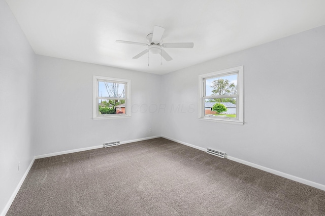 86 Arlington Ave, London, OH 43140 - spare room featuring carpet floors, a ceiling fan, and baseboards