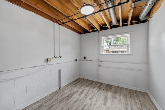 86 Arlington Ave, London, OH 43140 - below grade area with wood finished floors and baseboards