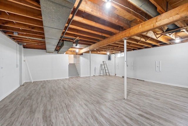 86 Arlington Ave, London, OH 43140 - unfinished below grade area featuring wood finished floors and concrete block wall