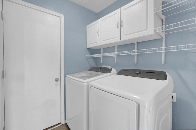 7209 Oliver Winchester Dr, Canal Winchester, OH 43110 - laundry area featuring cabinet space and washer and dryer