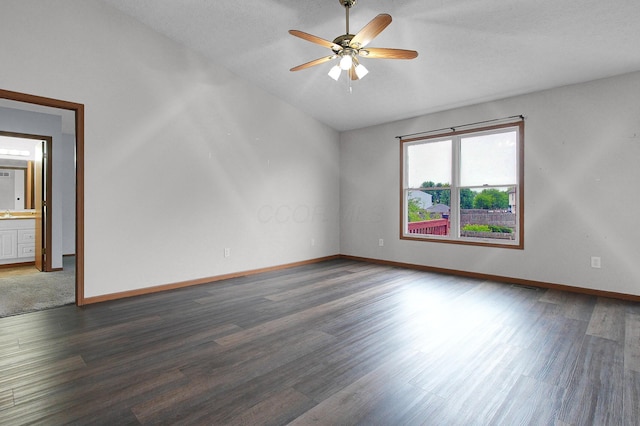 7209 Oliver Winchester Dr, Canal Winchester, OH 43110 - unfurnished room with wood finished floors, baseboards, a ceiling fan, a textured ceiling, and vaulted ceiling