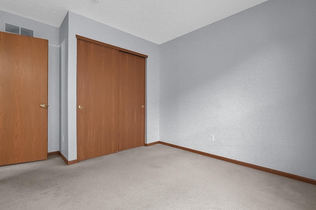 7209 Oliver Winchester Dr, Canal Winchester, OH 43110 - unfurnished bedroom with carpet floors, baseboards, and a closet
