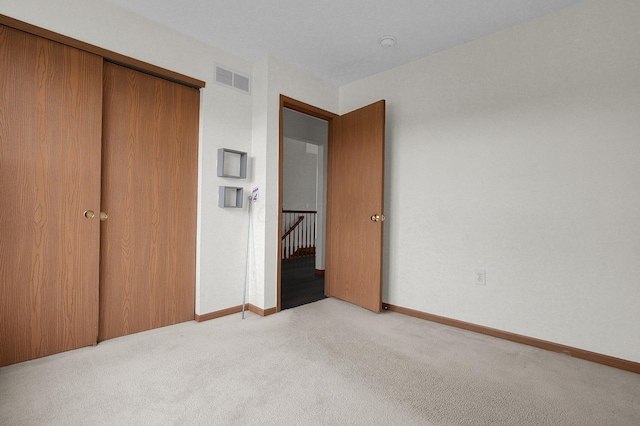 7209 Oliver Winchester Dr, Canal Winchester, OH 43110 - unfurnished bedroom featuring carpet, baseboards, and a closet