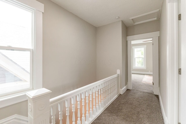 581 Kelton Ave, Columbus, OH 43205 - corridor featuring carpet floors, baseboards, and an upstairs landing