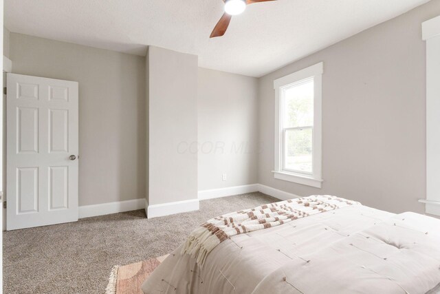 581 Kelton Ave, Columbus, OH 43205 - carpeted bedroom with baseboards and ceiling fan
