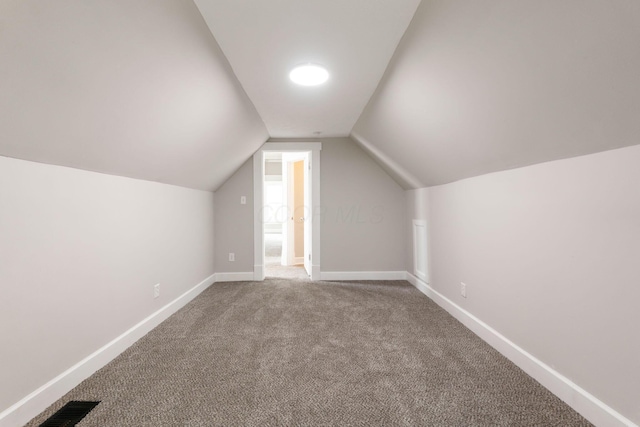 581 Kelton Ave, Columbus, OH 43205 - bonus room featuring lofted ceiling, carpet, and baseboards