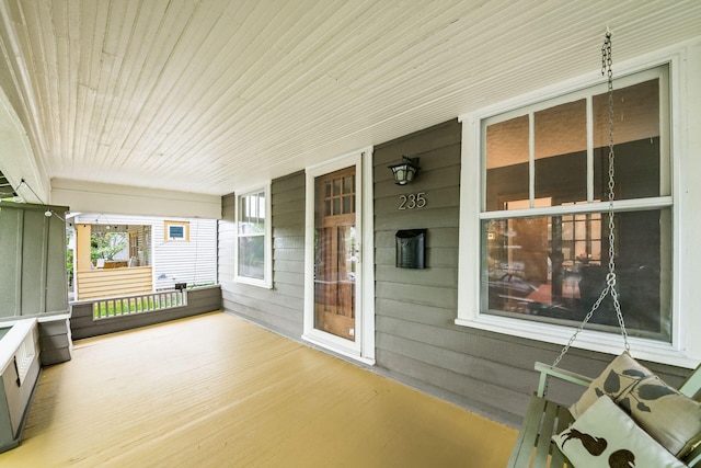wooden deck with a porch