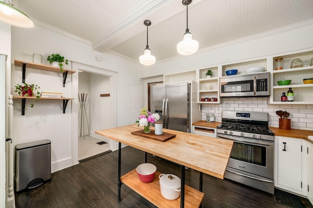 kitchen featuring appliances with stainless steel finishes, wood counters, open shelves, beamed ceiling, and backsplash