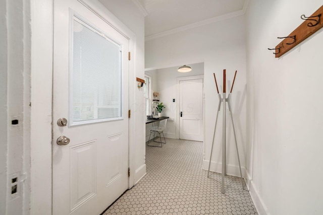 hall with crown molding and baseboards