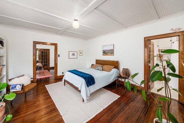 bedroom featuring french doors, hardwood / wood-style flooring, coffered ceiling, baseboards, and beam ceiling