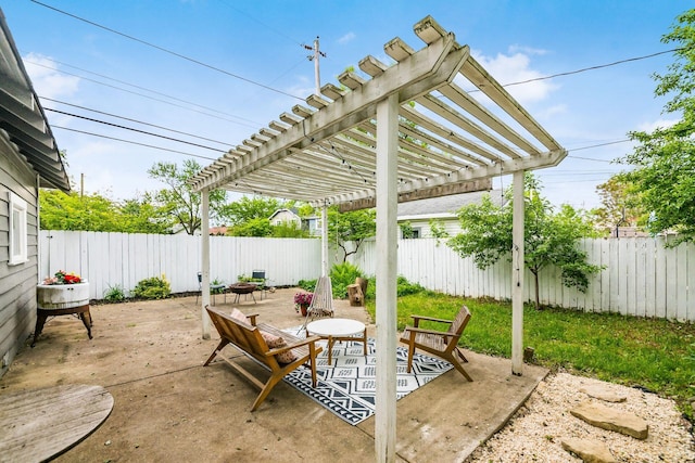view of patio / terrace with a pergola and a fenced backyard