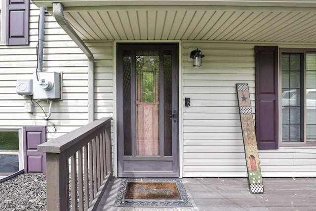 doorway to property featuring a porch