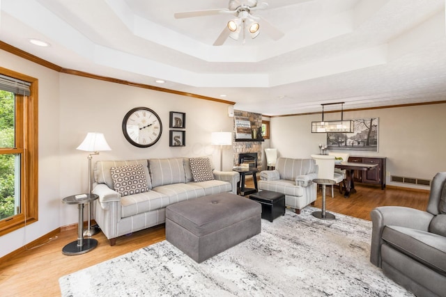 3690 Christopher Pl, Grove City, OH 43123 - living room featuring a raised ceiling, wood finished floors, ceiling fan, baseboards, and recessed lighting