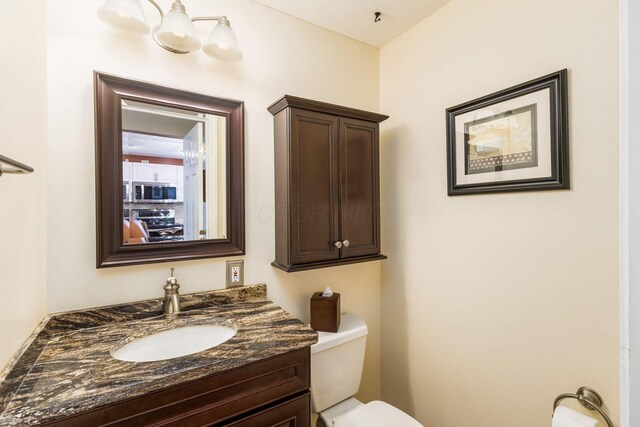 3690 Christopher Pl, Grove City, OH 43123 - half bathroom with vanity and toilet