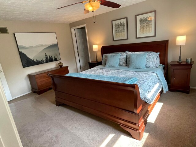 3690 Christopher Pl, Grove City, OH 43123 - bedroom featuring light carpet, baseboards, ceiling fan, and a textured ceiling