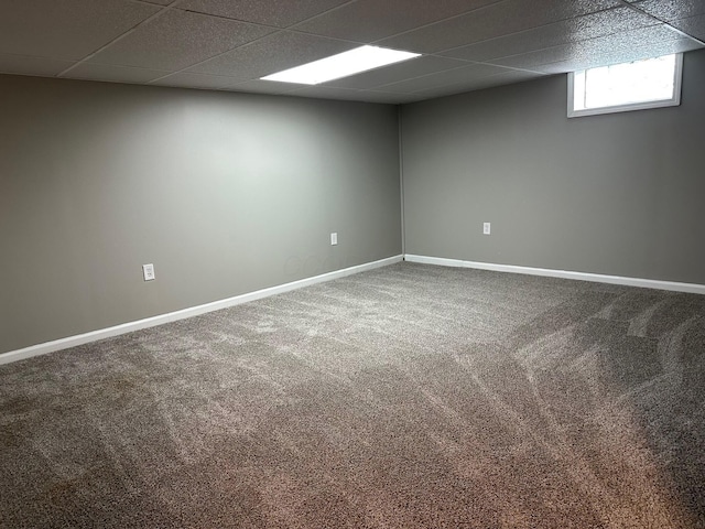 3128 Parsons Ave, Columbus, OH 43207 - below grade area with a paneled ceiling, carpet floors, and baseboards
