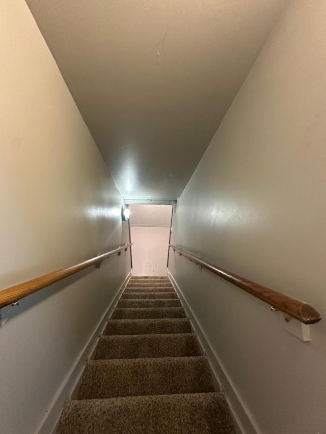 3128 Parsons Ave, Columbus, OH 43207 - stairway featuring carpet flooring