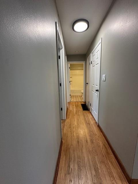 3128 Parsons Ave, Columbus, OH 43207 - corridor with light wood finished floors and baseboards