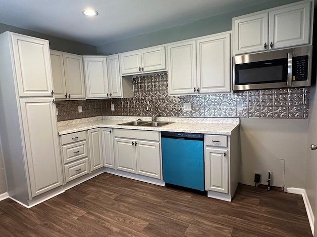 3128 Parsons Ave, Columbus, OH 43207 - kitchen featuring stainless steel microwave, dishwasher, a sink, light countertops, and recessed lighting