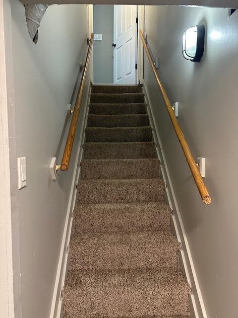 3128 Parsons Ave, Columbus, OH 43207 - staircase featuring carpet