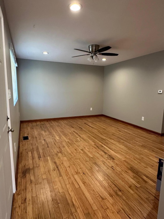 3128 Parsons Ave, Columbus, OH 43207 - spare room with light wood-style flooring, ceiling fan, recessed lighting, and baseboards