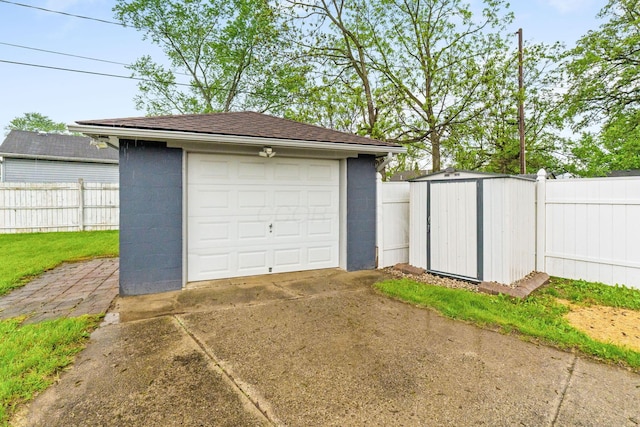 259 Merriman Dr, West Jefferson, OH 43162 - detached garage with concrete driveway and fence