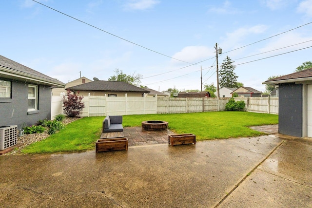 259 Merriman Dr, West Jefferson, OH 43162 - view of patio with a fire pit and central AC unit