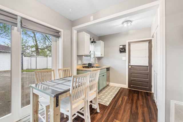 259 Merriman Dr, West Jefferson, OH 43162 - dining room featuring dark wood finished floors and baseboards
