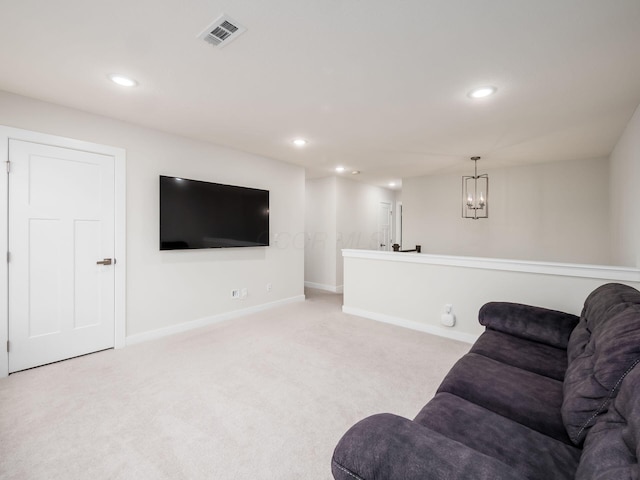 418 Amethyst Ct, Delaware, OH 43015 - carpeted living room featuring a chandelier, baseboards, and recessed lighting