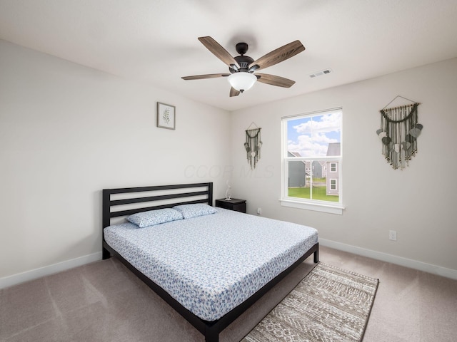 418 Amethyst Ct, Delaware, OH 43015 - bedroom with light carpet, baseboards, and ceiling fan