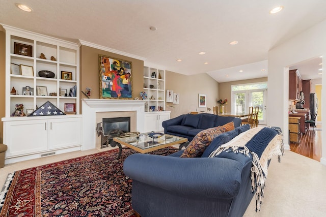 6227 Marias Point Ln, Columbus, OH 43213 - living room with recessed lighting, a fireplace with flush hearth, and built in shelves