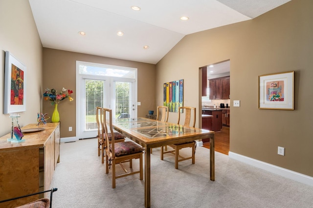 6227 Marias Point Ln, Columbus, OH 43213 - dining room with baseboards, light colored carpet, lofted ceiling, and recessed lighting