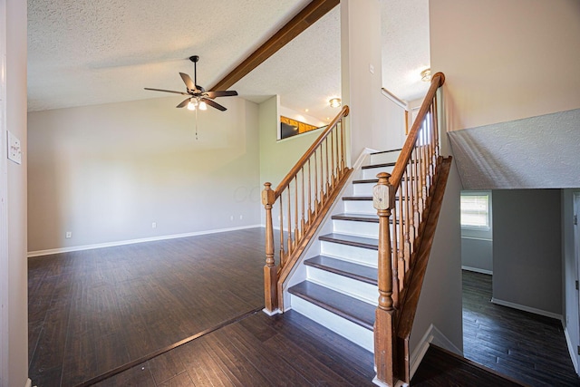 9721 State Rte 521, Sunbury, OH 43074 - staircase featuring a ceiling fan, lofted ceiling, a textured ceiling, wood finished floors, and baseboards
