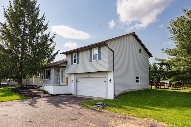 9721 State Rte 521, Sunbury, OH 43074 - split level home featuring an attached garage and asphalt driveway