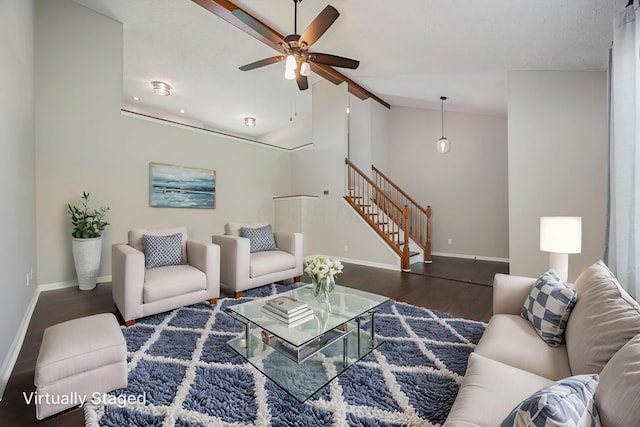 9721 State Rte 521, Sunbury, OH 43074 - living room featuring lofted ceiling, wood finished floors, baseboards, a ceiling fan, and stairs