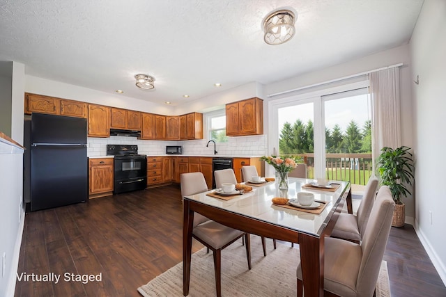 9721 State Rte 521, Sunbury, OH 43074 - dining room featuring dark wood finished floors and baseboards