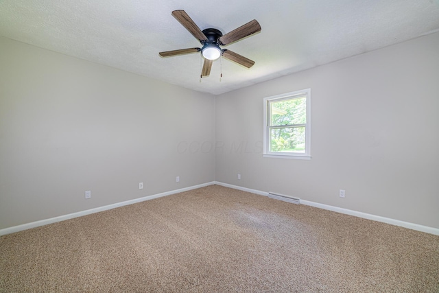 2814 Nesbitt Rd, Caledonia, OH 43314 - carpeted empty room with baseboards and ceiling fan