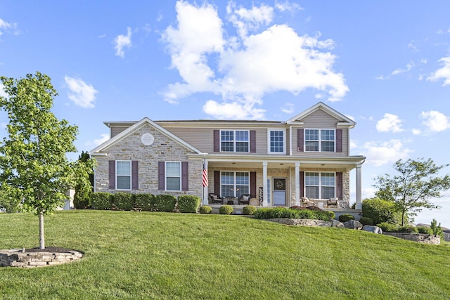 607 Green Forest Pl, Lithopolis, OH 43136 - view of front facade featuring a front yard and stone siding