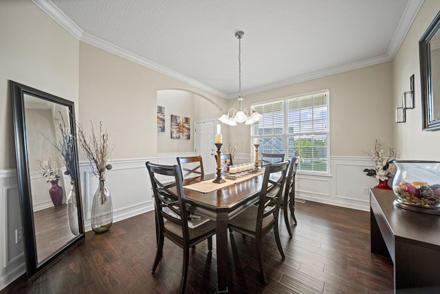 607 Green Forest Pl, Lithopolis, OH 43136 - dining room featuring a chandelier, dark wood-type flooring, wainscoting, ornamental molding, and arched walkways