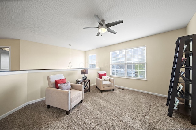 607 Green Forest Pl, Lithopolis, OH 43136 - sitting room featuring ceiling fan, carpet floors, and baseboards