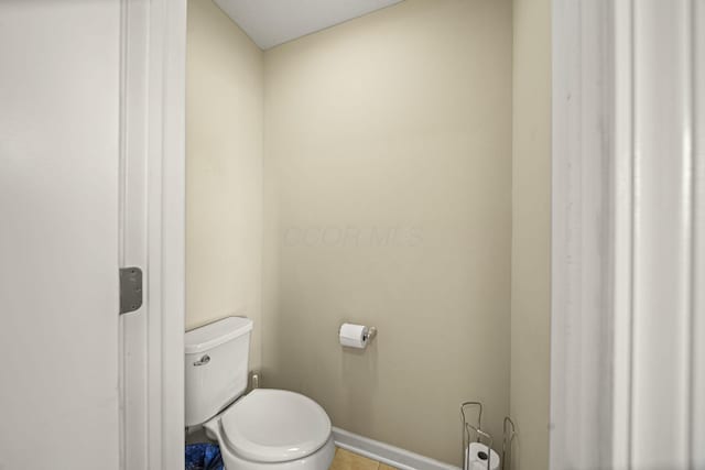 607 Green Forest Pl, Lithopolis, OH 43136 - bathroom featuring toilet, baseboards, and tile patterned floors