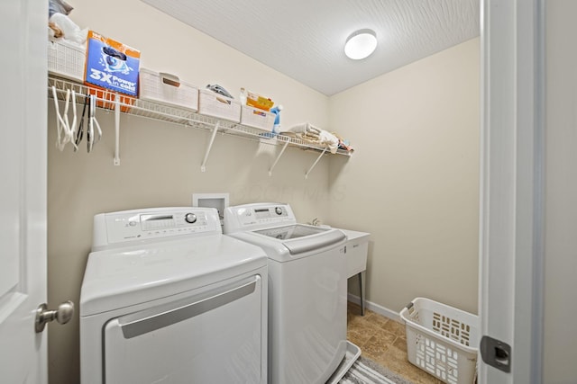 607 Green Forest Pl, Lithopolis, OH 43136 - laundry room featuring separate washer and dryer, baseboards, and light tile patterned flooring