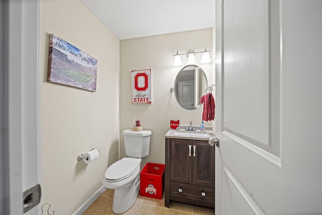 607 Green Forest Pl, Lithopolis, OH 43136 - bathroom featuring toilet, vanity, tile patterned flooring, and baseboards