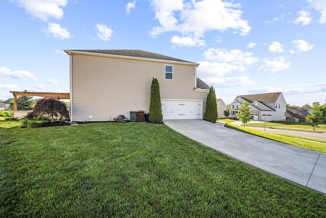 607 Green Forest Pl, Lithopolis, OH 43136 - view of side of property with a garage, driveway, a lawn, and a residential view