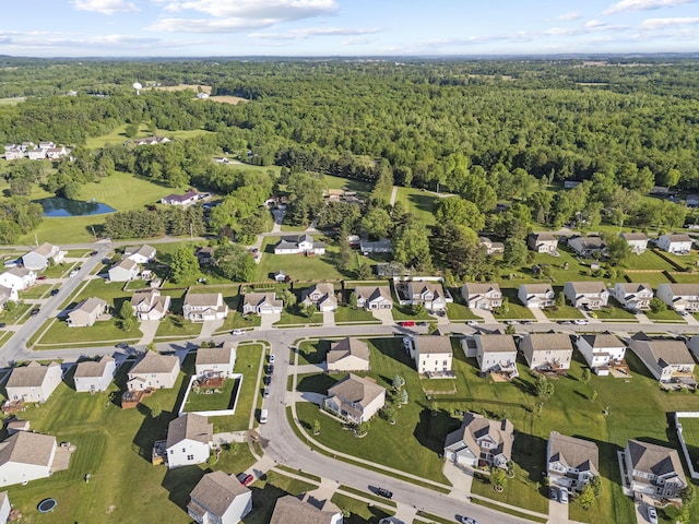 607 Green Forest Pl, Lithopolis, OH 43136 - aerial view of property and surrounding area with a heavily wooded area, a nearby body of water, and nearby suburban area