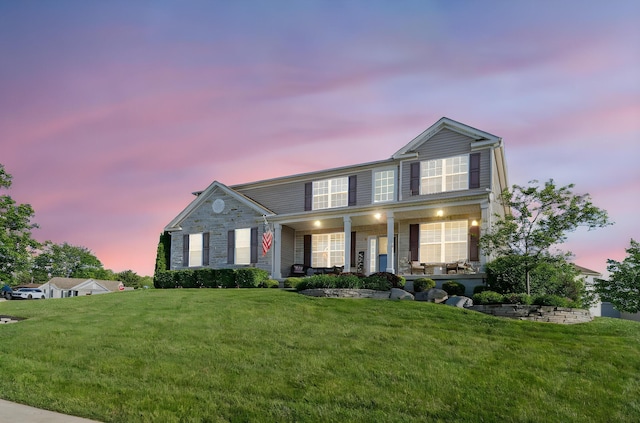 607 Green Forest Pl, Lithopolis, OH 43136 - view of front of house with a porch and a front yard
