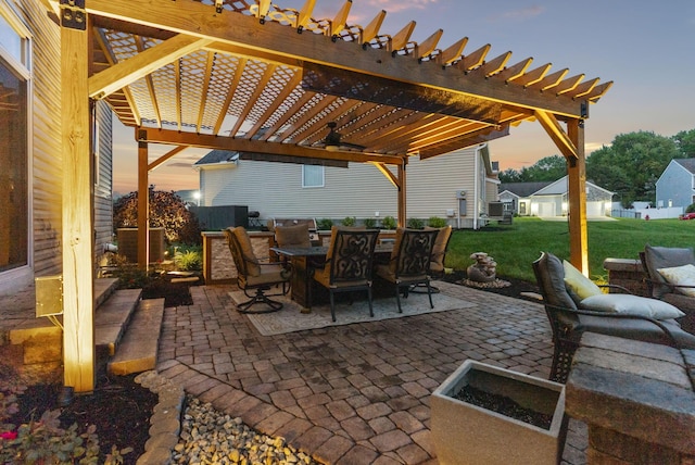607 Green Forest Pl, Lithopolis, OH 43136 - patio terrace at dusk with a pergola, a ceiling fan, a lawn, a patio area, and outdoor dining space