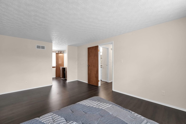 1235 Belle Meade Pl, Westerville, OH 43081 - unfurnished room featuring dark wood finished floors, baseboards, and a textured ceiling
