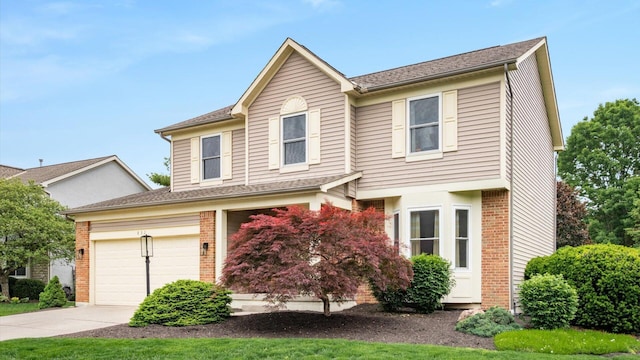 832 Mcleod Parc, Pickerington, OH 43147 - traditional-style home featuring brick siding, concrete driveway, and an attached garage
