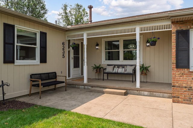 6235 George Fox Dr, Galloway, OH 43119 - entrance to property featuring covered porch and brick siding